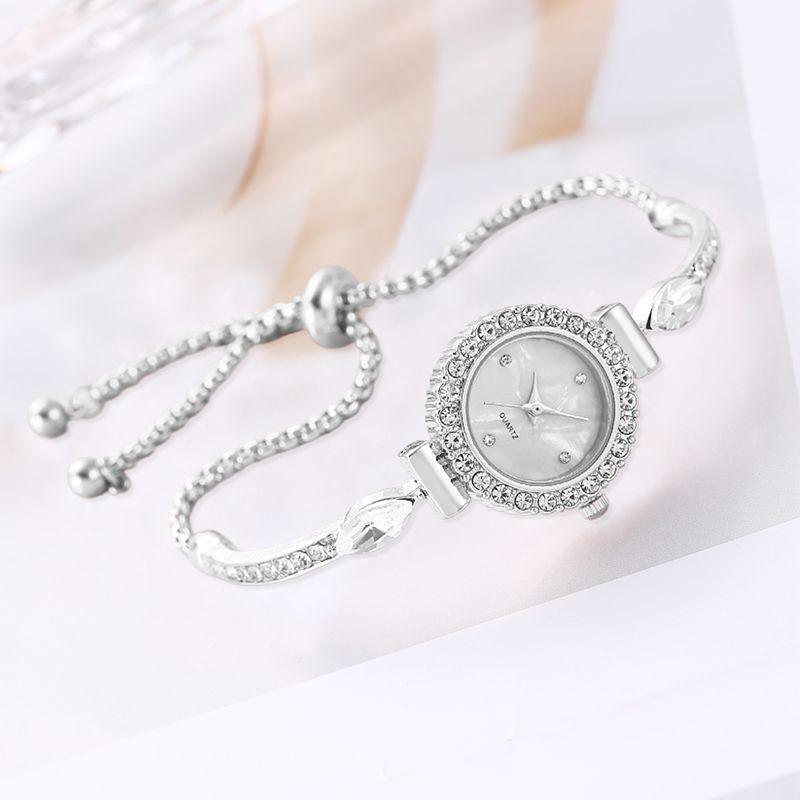 Armbanduhr mit diamantbesetztem Zifferblatt und ausziehbarem Armband